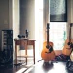 Guitars sitting in a music studio