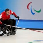 Throwing a Rock in Wheelchair Curling
